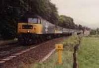 Class 47 hauled passenger train running north over Blair Atholl viaduct.<br><br>[Ewan Crawford //]