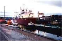 Disused rails in Invergordon harbour. View looks east.<br><br>[Ewan Crawford //]