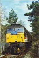 Last excursion train to Dufftown before closure. Train hauled by class 47 by Drummuir.<br><br>[Ewan Crawford 24/03/1991]