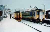 Garve station looking west with two sprinters in snow.<br><br>[Ewan Crawford //]