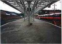 Largs station, under glass canopy, looking south. Class 318 in station.<br><br>[Ewan Crawford //]