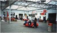 Under glass canopy in Largs station circulating area.<br><br>[Ewan Crawford //]