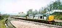 Class 37 hauled sleeper train heading south at Rannoch station.<br><br>[Ewan Crawford //]