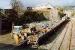 Class 37 hauled ballast train being loaded at Kyle of Lochalsh. View looks north.<br><br>[Ewan Crawford //]