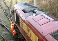 Pilot boarding a loaded coal train at the entrance to Cockenzie PS sidings in April 2002 <br><br>[John Furnevel 12/04/2002]