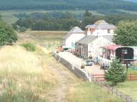 View over Cromdale Station, on the former Elgin-Aviemore line, looking north from the bridge in August 2006. The trackbed is now part of the Speyside Way. <br><br>[John Gray 03/08/2006]