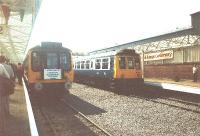 Largs Station celebrates its centenary in 1985.The DMU nearest the camera carries a headboard proclaiming the event.<br><br>[John Gray //]