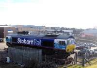 66048 stands on a low-loader at Inverness depot on 3 March 2010 following recovery from the Carrbridge crash site. <br><br>[Keir Hardie 03/03/2010]