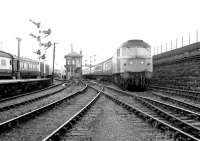 A class 47 brings a Glasgow - Aberdeen train into Dundee on 19 March 1980, just as a class 40 restarts an Aberdeen - Edinburgh service from platform 1.<br><br>[John Furnevel 19/03/1980]