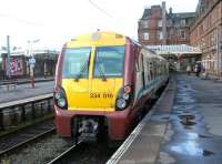 A train for Glasgow Central awaiting its departure time at Ayr station in July 2002.<br><br>[John Furnevel 12/07/2002]