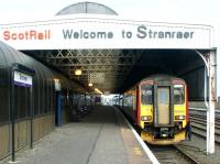 Looking along the operational platform at Stranraer Harbour station on 17 August 2003. A train for Glasgow Central is awaiting its departure time.<br><br>[John Furnevel 17/08/2003]