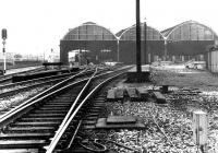 A Liverpool bound BR Trans-Pennine service passing the abandoned Manchester Exchange station in 1970.<br><br>[John Furnevel 20/11/1970]