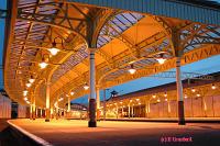 Canopies covering platforms 3 and 4 as seen from the trackbed, now in use as a carpark. Platforms 1 and 2, still in use, are seen to the right.<br><br>[Ewan Crawford 4/6/2004]