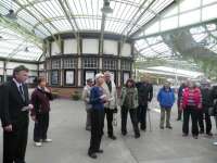 'Beyond the end of the line' exhibition, Wemyss Bay. Nancy Cameron inviting Innes Nelson to declare the exhibition open, with creators Chris Hogg and Lynn Patrick standing alongside.<br>
<br><br>[First ScotRail 01/05/2010]