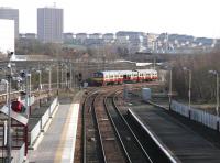 A train for Dalmuir leaving Springburn in February 2005.<br><br>[John Furnevel 19/02/2005]