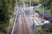 View looking east at Haughhead Junction as the junction panel is delivered to the site.<br><br>[Ewan Crawford 10/10/2004]