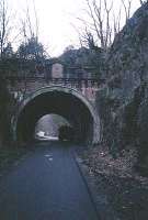 Tunnel to the west of Bowling station. The plaque has the date of construction of the railway 1895.<br><br>[Ewan Crawford //]