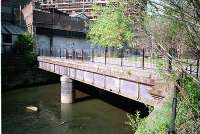 Kelvin Bridge station. The railway and two platforms crossed this bridge and entered the tunnel, now blocked, beyond.<br><br>[Ewan Crawford //]