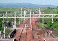 Looking west at the former junction to the west of Paisley St James station. The branch still existed to Linwood but the junction itself had been taken out. Note rails in centre left.<br><br>[Ewan Crawford //]