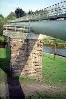 Drymen viaduct, now in use for the Loch Lomond Water Supply Scheme water pipe, looking east.<br><br>[Ewan Crawford //]