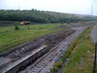 Onllwyn looking south-west to Neath. The poor old station is in the foreground and the truck is bringing coal to the washery. <br><br>[Ewan Crawford 06/07/2006]