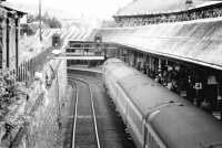 Looking east along platform 4 at Dundee in 1982 as an Aberdeen train arrives.<br><br>[John Furnevel 04/02/1982]