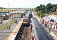 Trains to and from Glasgow Queen Street meet at Croy station in July 2006 - looking south west. <br><br>[John Furnevel 26/07/2006]