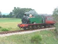 Looking like a refugee from Sodor, Strathspey Railways No.17 approaches Broomhill on the old Aviemore to Forres line. July 2006.<br><br>[John Gray /07/2006]