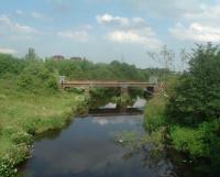 This shows the rail bridge that crosses the River Cart carrying the line to Bridge Of Weir and Greenock Princes Pier. Taken from the Rail Bridge that served the Kilbarchan Loop, this is where the lines separated at Cart junction.<br><br>[Graham Morgan 18/07/2006]