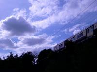 Looking up to the main line from the Fly-under at Elderslie, this shows a Southbound modernised Class 318 .<br><br>[Graham Morgan 26/06/2006]