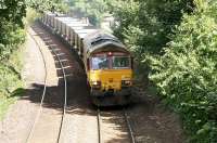 EWS 66163 with westbound coal empties near Blackford Hill on the Edinburgh sub in August 2006.<br><br>[John Furnevel 06/08/2006]