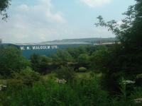 Looking south, this show the old railway viaduct over the River Cart that went to Johnstone North and the goods yard there.<br><br>[Graham Morgan 18/07/2006]