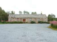 Grantown East viewed from the station approach. Fresh gravel has been laid and the area cleaned up. The building is in good condition but the roof is in a poor state of repair. 03/08/06.<br><br>[John Gray 03/08/2006]