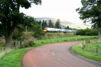 The 12.37 special Glasgow Central - London Euston Virgin Pendolino during its record breaking non-stop run of 3 hours 55 minutes on 22 September 2006. The special is seen here approaching Lamington Viaduct.<br><br>[John Furnevel 22/09/2006]