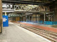 Looking west along platform 19 at Waverley on 5 August 2006 with both tracks and crossover in place. The new bridge and walkway system is under construction and the temporary (green) bridge into Princes Mall lies beyond.<br><br>[John Furnevel 05/08/2006]