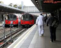 Passengers heading for a Willesden Green Jubilee line train along Stratford's platform 13 on 22 July 2005.<br><br>[John Furnevel 22/07/2005]