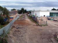 The new supermarket and flats are fairly progressing at the new site to be Alloa station.<br><br>[Ewan Crawford 13/08/2006]