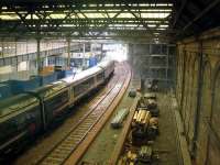 Fife bound (and busy) service awaits departure. New Balmoral platform to right.<br><br>[Ewan Crawford 12/08/2006]