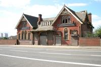 The old station building at Possil (closed 1964) puts on a brave face to Balmore Road in August 2006.<br><br>[John Furnevel 14/08/2006]