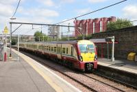 A Springburn - Dalmuir train arrives at Duke Street on a sunny August afternoon in 2006. <br><br>[John Furnevel 14/08/2006]