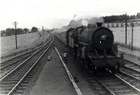 Returning Ayr Race Specials. 42828 approaching Kilbarchan.<br><br>[G H Robin collection by courtesy of the Mitchell Library, Glasgow 21/07/1959]