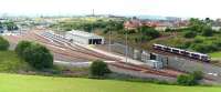 Edinburgh bound shuttle passing Eastfield depot on an August morning in 2006. <br><br>[John Furnevel 27/08/2006]