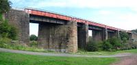 Plate-girder viaduct crossing the Monkland Canal near Calder between Whifflet and Airdrie. The odd looking arrangement of the stone piers was to fit in with the canal alignment. Summer 2006. <br><br>[John Furnevel 02/08/2006]