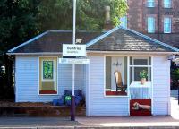 The northbound platform of Dumfries station in July 2013, now featuring some of the creations of artist Jenny Finch [see news item].<br><br>[ScotRail /07/2013]