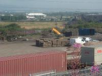 Work continuing on WH Malcolms Elderslie Goods Yard. Extra lines are being added so that longer freight trains can use the site and an extra loop added to give better access to the main line. Here new sleepers wait to be put to use.<br><br>[Graham Morgan 16/08/2006]