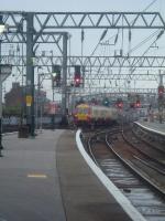 Class 334 Juniper departing Glasgow Central<br><br>[Graham Morgan 26/08/2006]