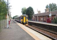 An East Kilbride - Glasgow Central service stopped at Pollokshaws West in August 2006.<br><br>[John Furnevel 11/08/2006]