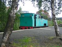 NCB no 9, (Hudswell Clarke 895/1909) which spent its latter years at Bedlay Colliery, in the yard at Summerlee Heritage Centre in August 2006. Sunnyside station is just beyond the roadbridge in the background.<br><br>[John Furnevel 29/08/2006]