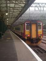 Class 156 156494 at the head of four Class 156 units stabled at Glasgow Central Platform 9<br><br>[Graham Morgan 26/08/2006]