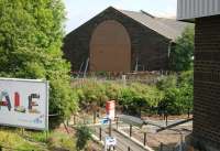 Part of the enormous former goods shed standing alongside Barrhead station in August 2006, photographed from the northbound platform.<br><br>[John Furnevel 17/08/2006]